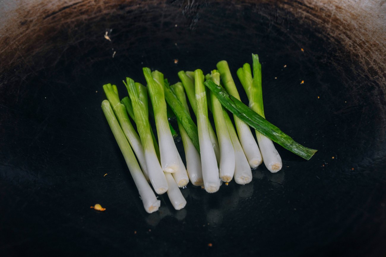 scallion whites in wok