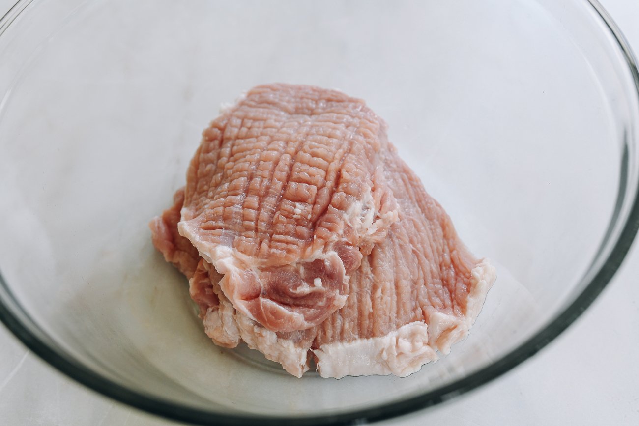 pounded pork chops in bowl